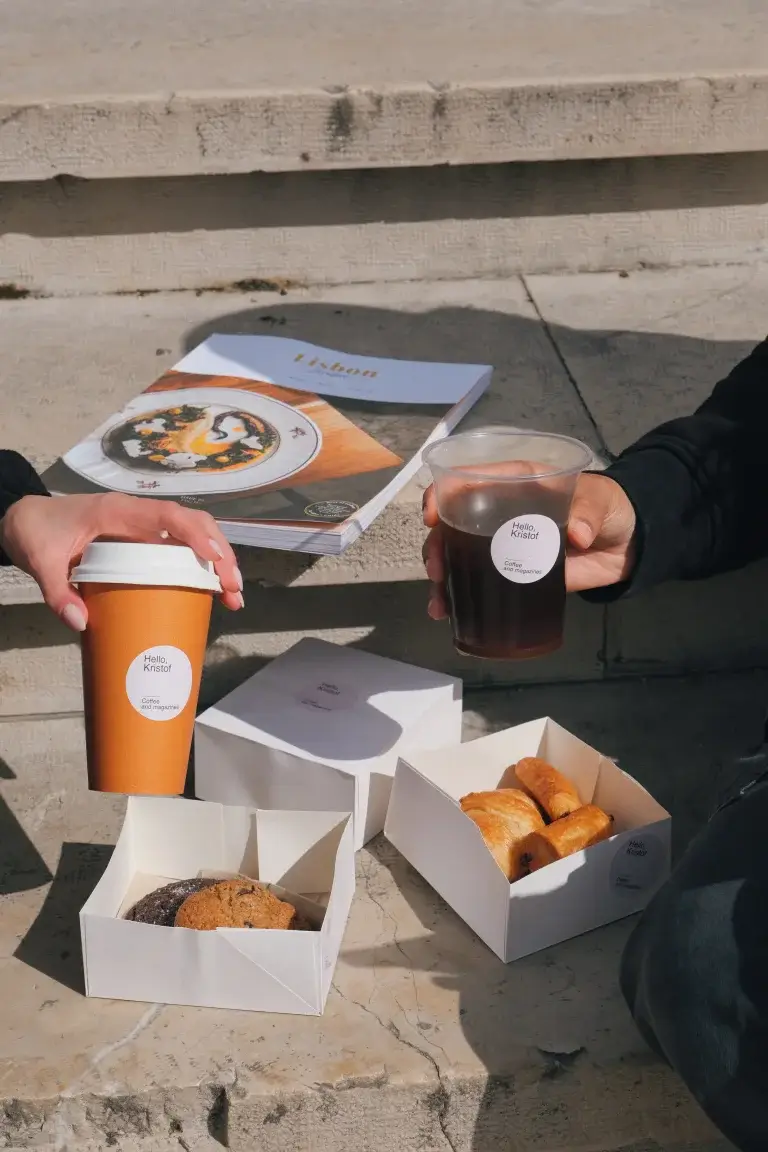 Coffee and pastries from Hello, Kristof arranged on steps with the Pantheon in the background